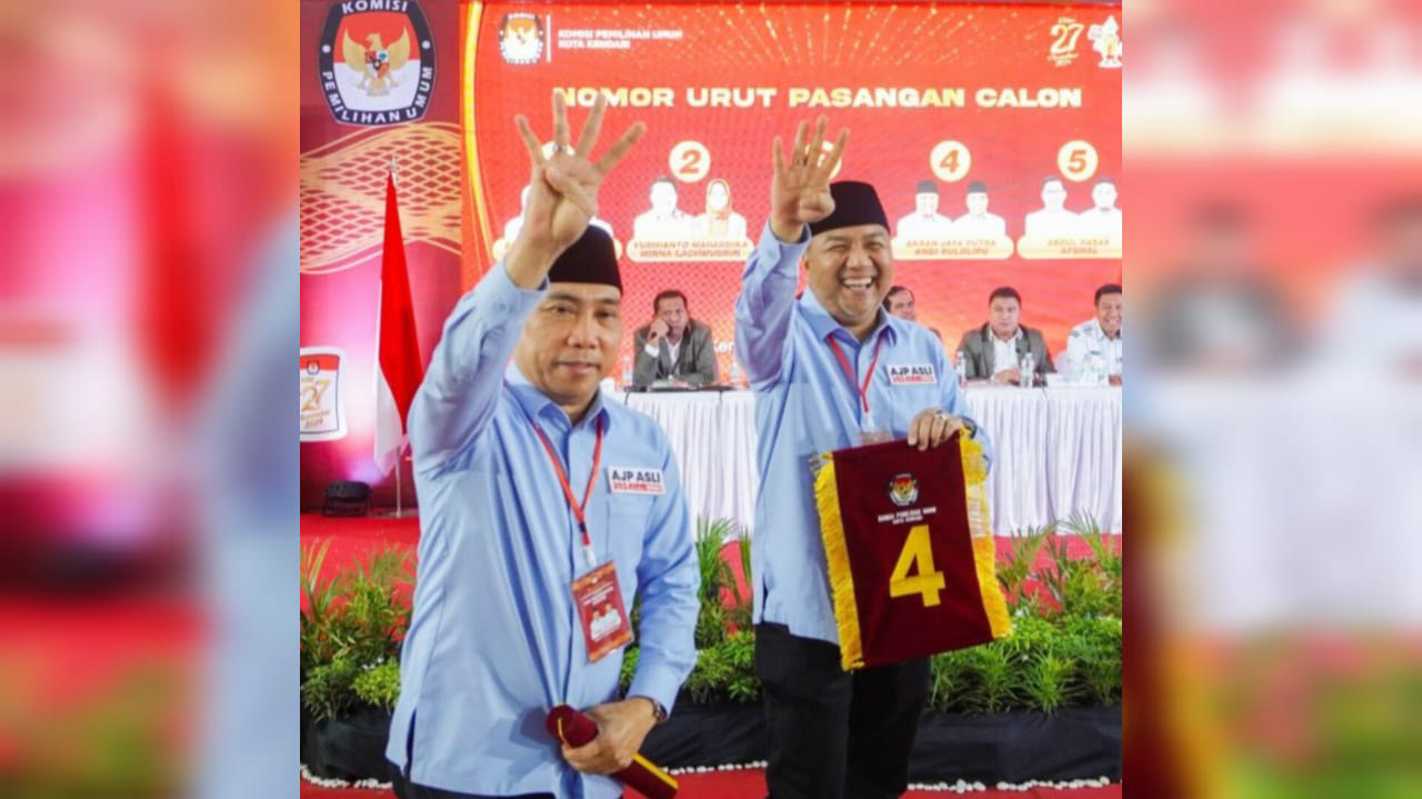 Pasangan calon wali kota dan Wakil Wali Kota Kendari nomor urut 4, Aksan Jaya Putra-Andi Sulolipu. Foto/R. Hafid/bentaratimur.id